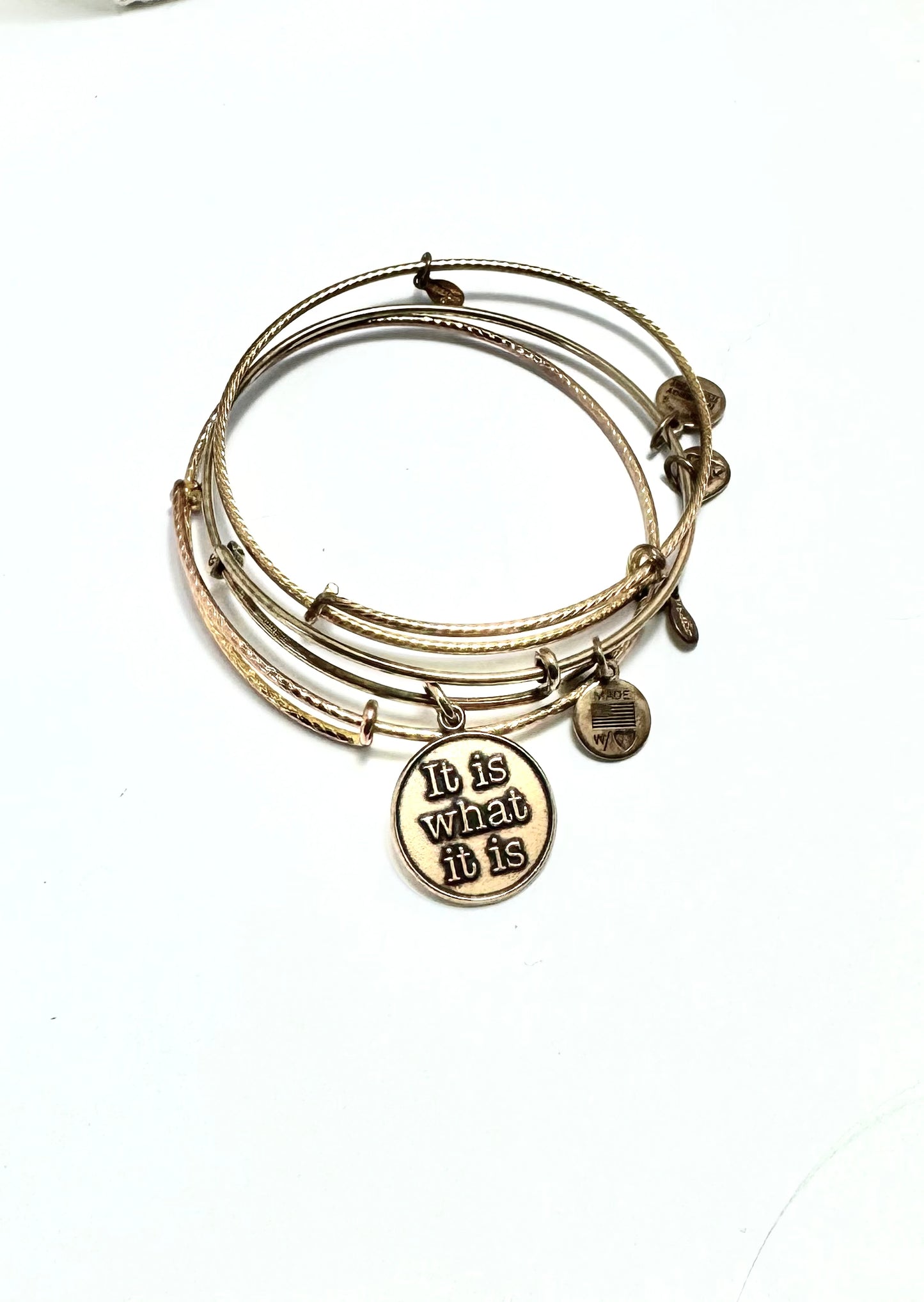 Alex and Ani - “It Is What It Is” Charm Bangle Bracelet Plus 2 Gold Textured Bangles
