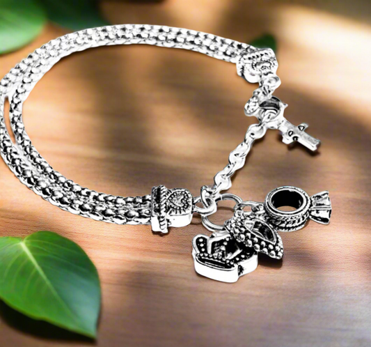 Premier Designs Charm Silver Tone Bracelet, Charms Dangling Hearts, Cross, Crown, Ring Charm with Crystal, Closes with Lobster Clasp