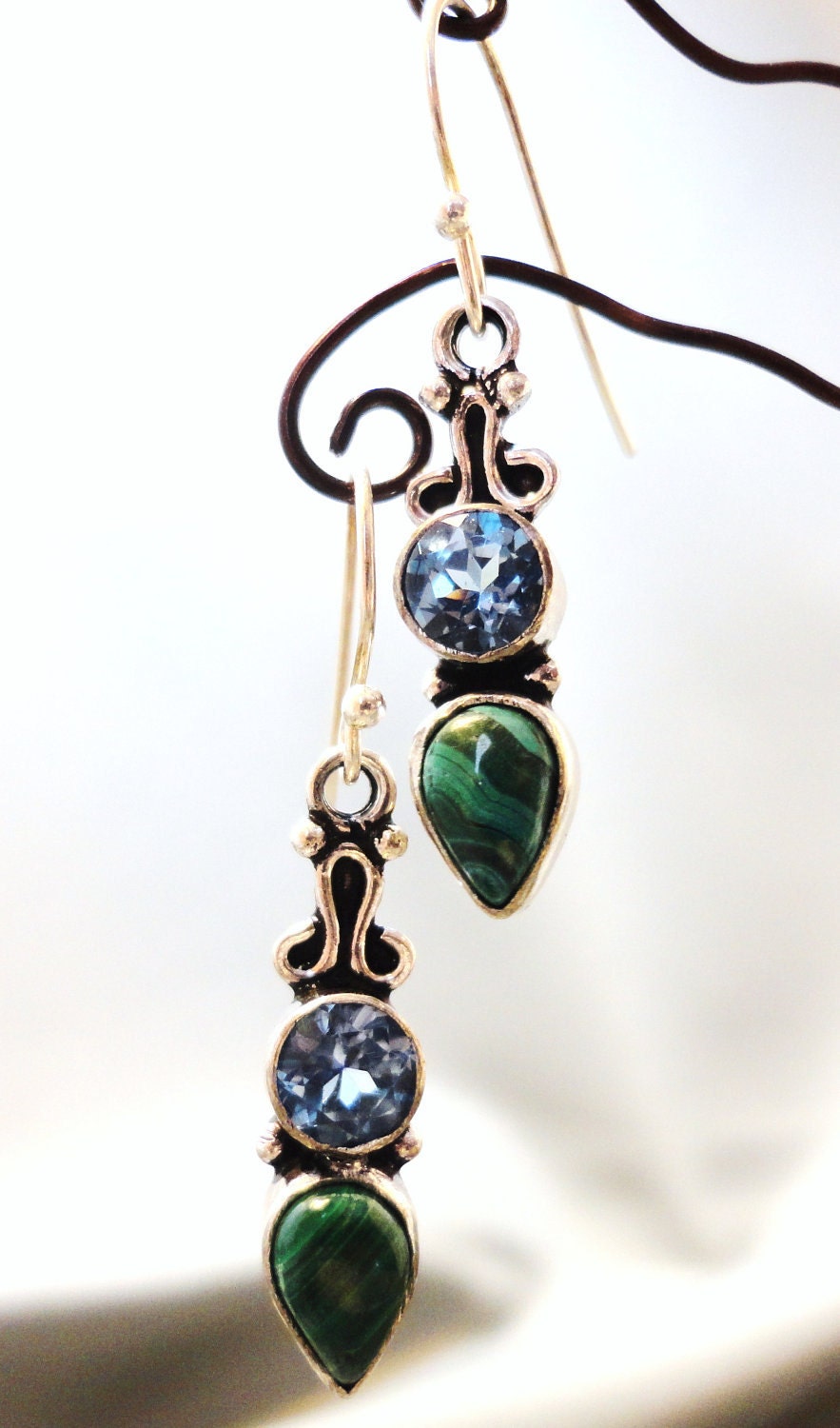 Malachite and Swiss Blue Topaz Encased in Silver